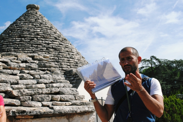  The guide Mimmo visiting the trulli